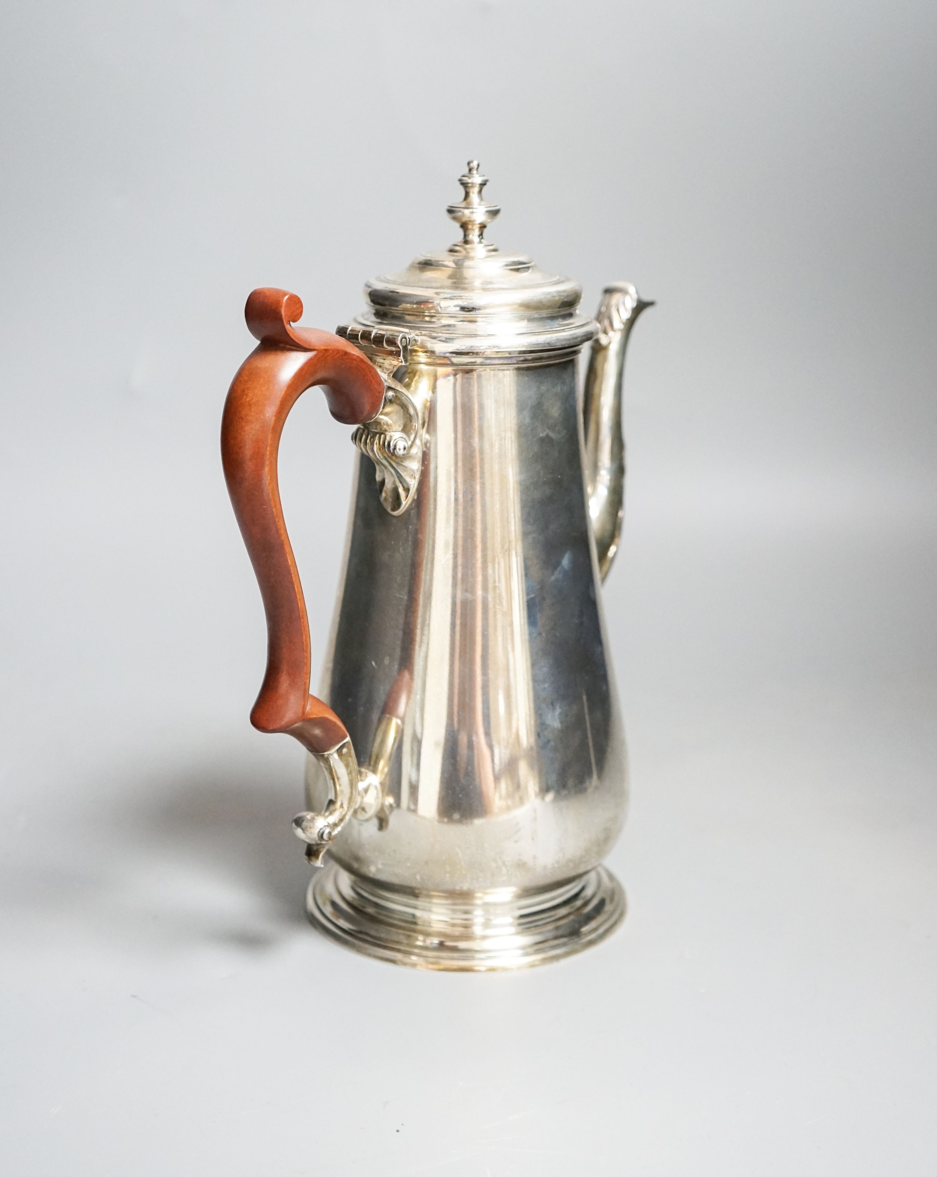A modern silver coffee pot, by C.J. Vander Ltd, London, 1971, height 24.9cm, gross 29.5oz.